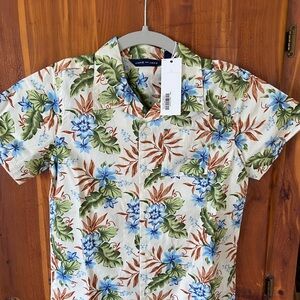 Boy’s tropical print shirt and drawstring shorts.